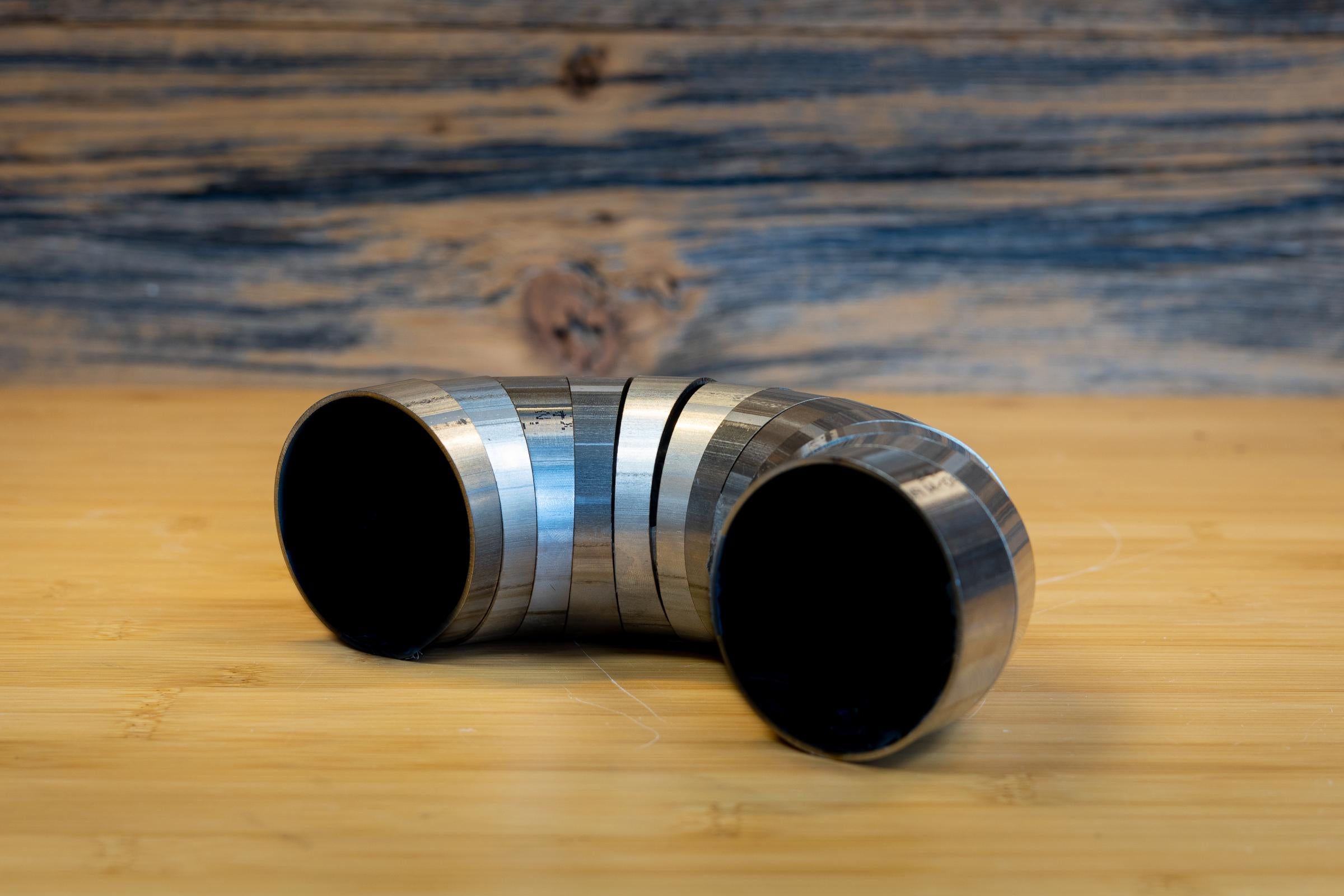 MBRP 2.5-Inch Exhaust Universal Fit T304 Stainless Steel Universal T304 Stainless Steel 2.5 Inch Diameter 180 Degree Pie Cut Kit